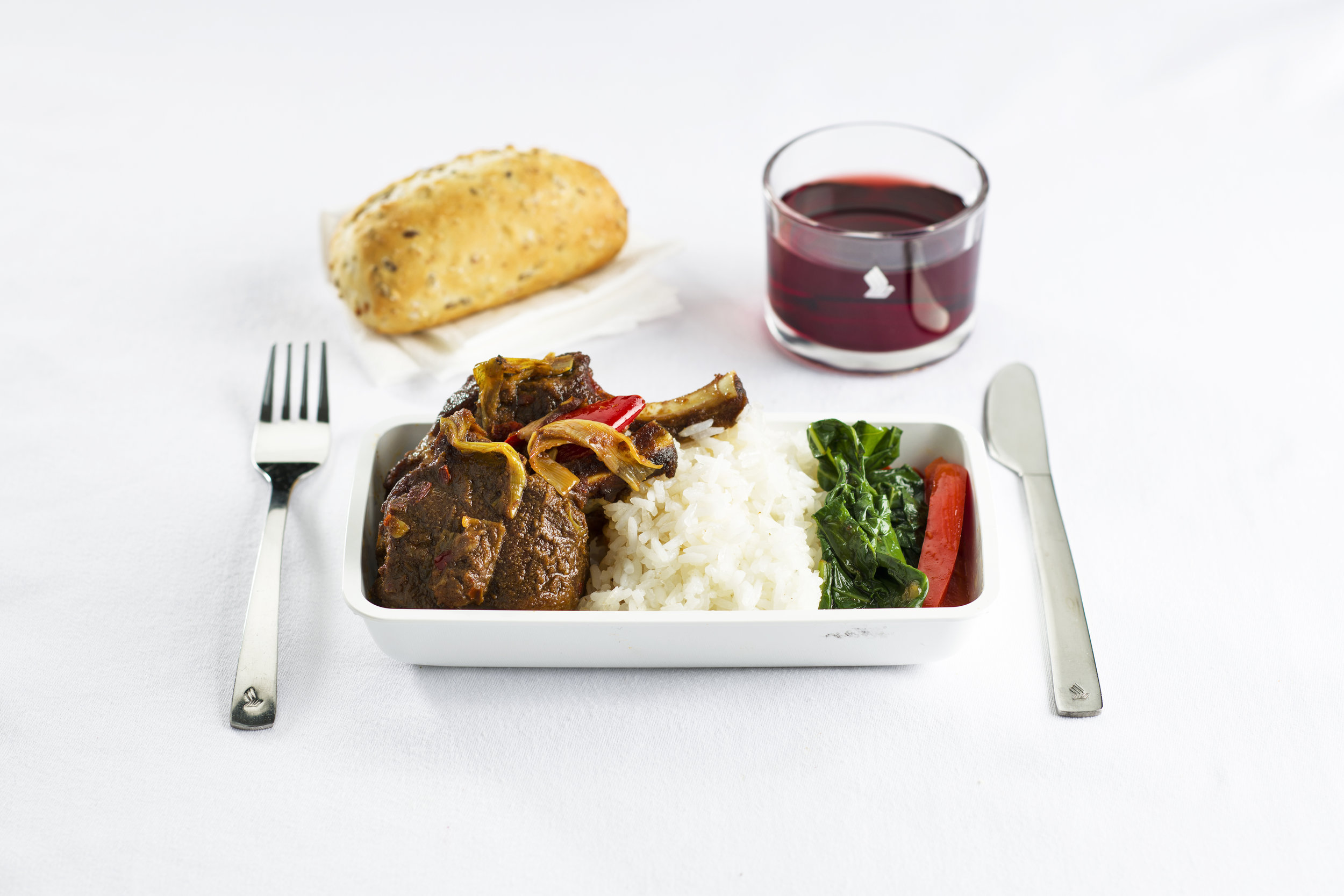 lamb with chilli and cumin jasmine rice and stir fried gai lan