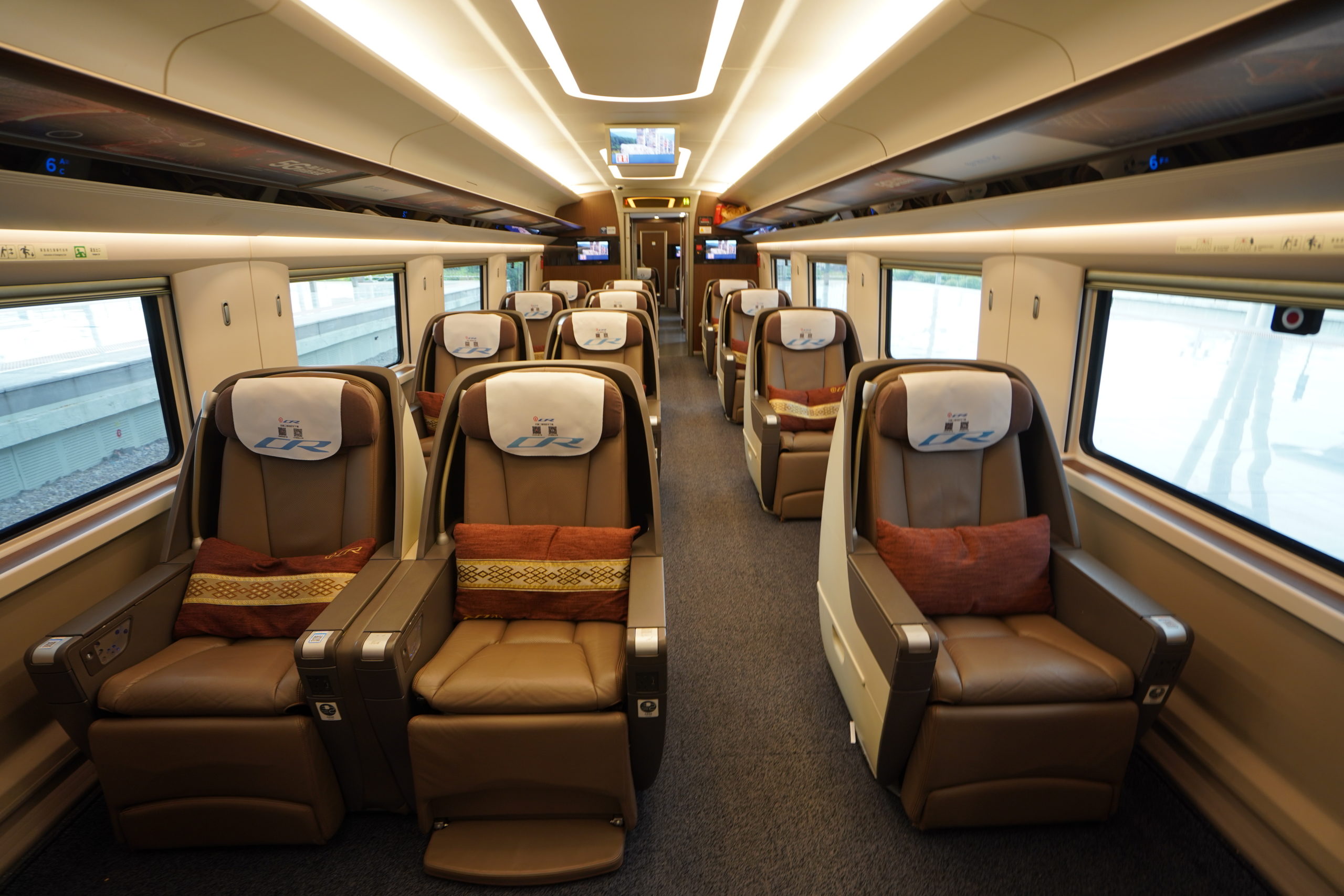 Business class seat with luxury travel setup